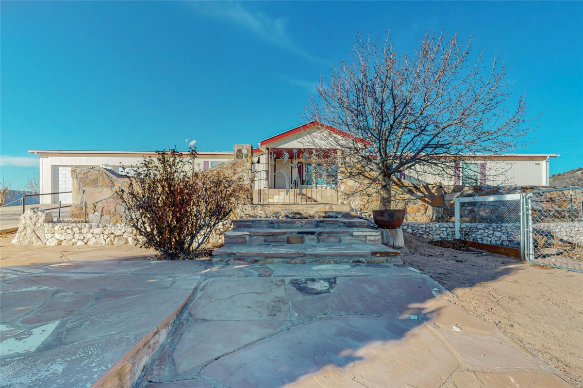 391 COUNTY ROAD 142, MEDANALES, NM 87548, photo 1 of 72