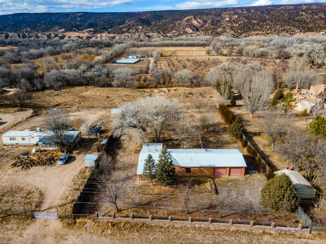 203 COUNTY ROAD 41, LOS LUCEROS, NM 87511, photo 1 of 17